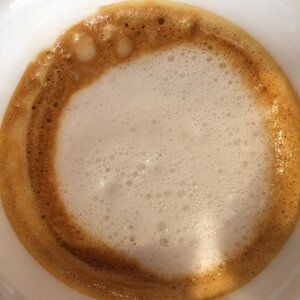 A view of dense milk foam of a cappuccino prepared with freshly roasted Valmandin gourmet coffee - the best coffee in Switzerland.